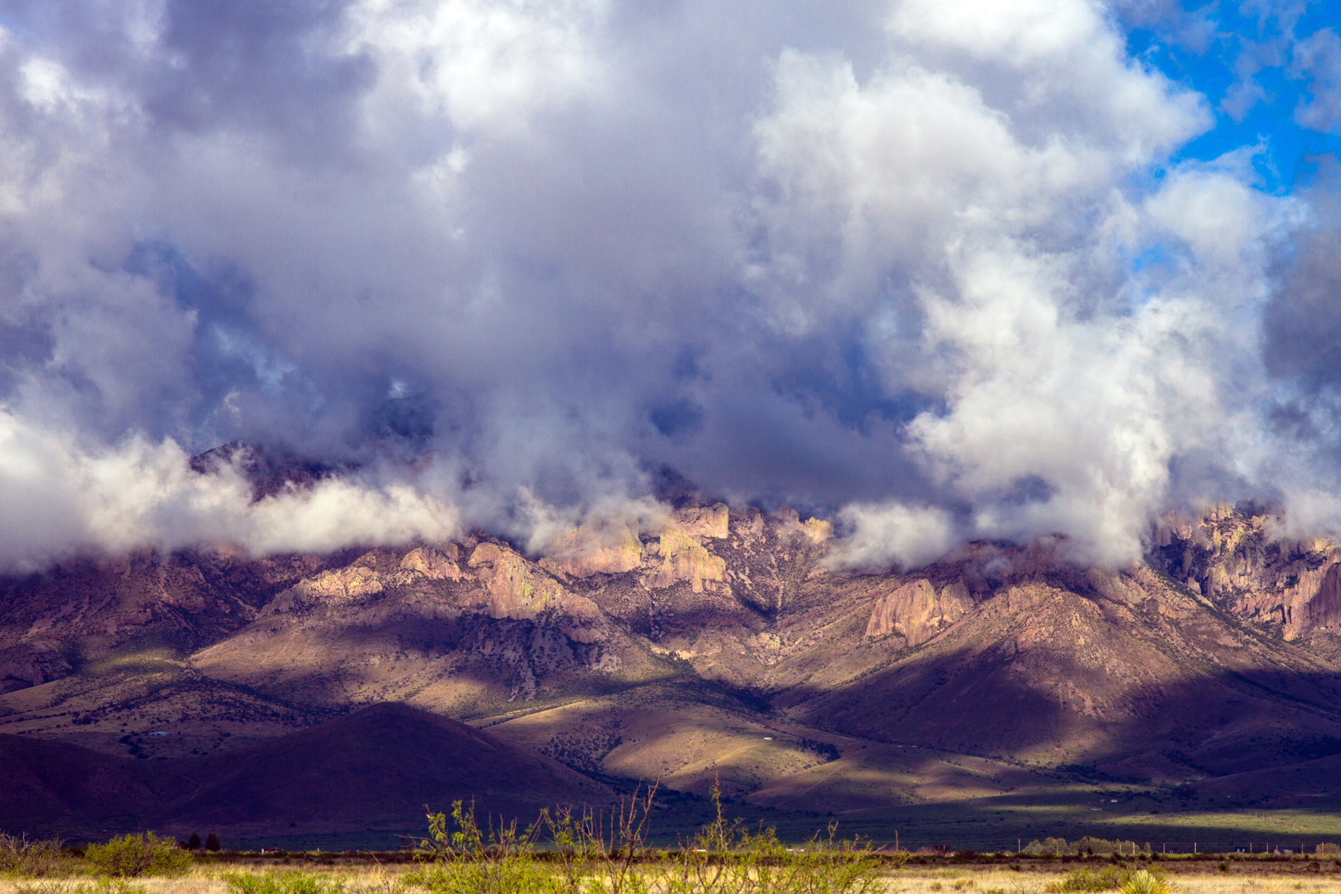 Storm clouds breaking over the Chiricahua Mountains above the San Simon Valley